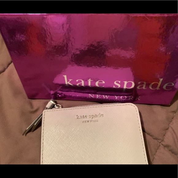 kate spade Handbags - ♠️ Small gray wallet.♠️
